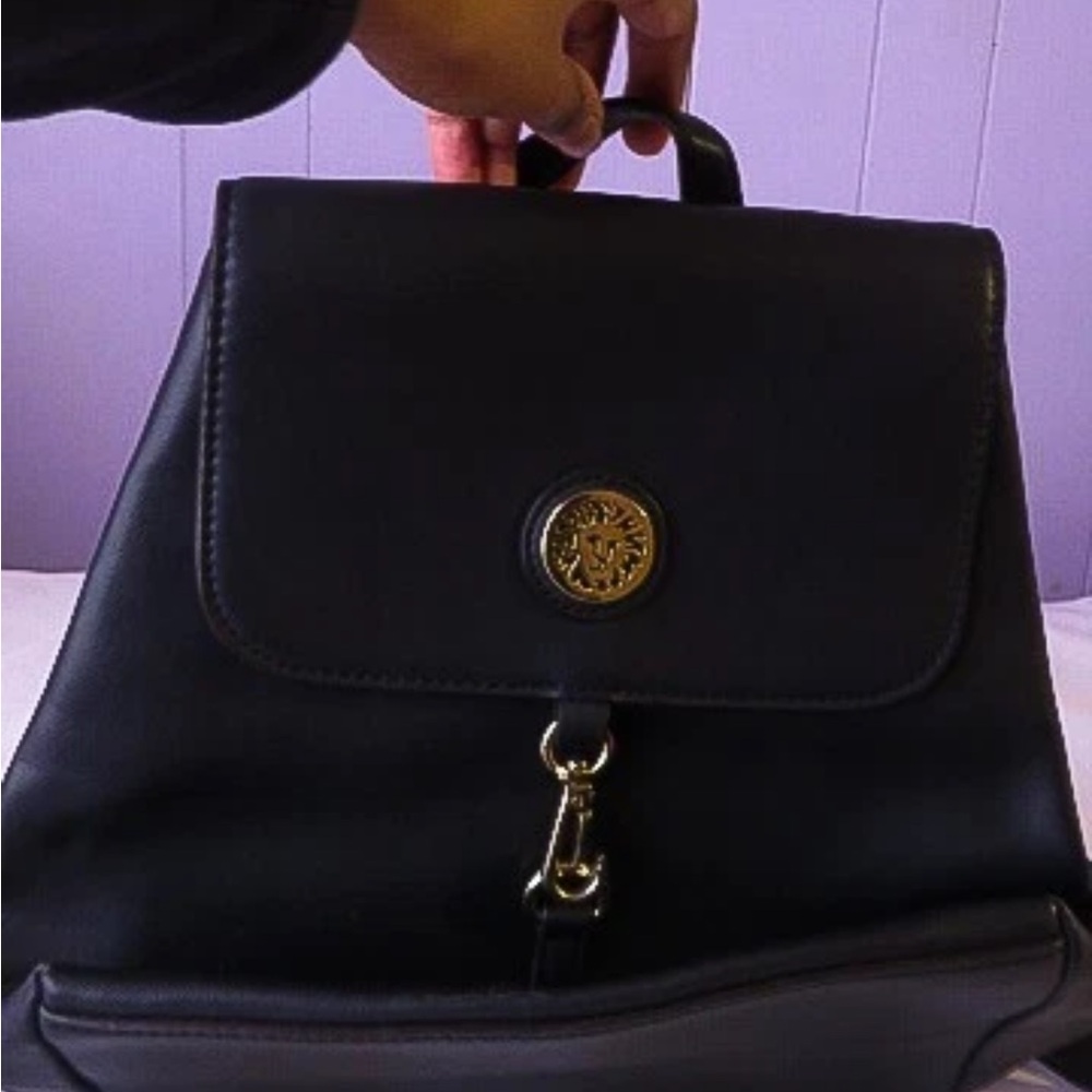Chic Black Backpack with Gold Accent